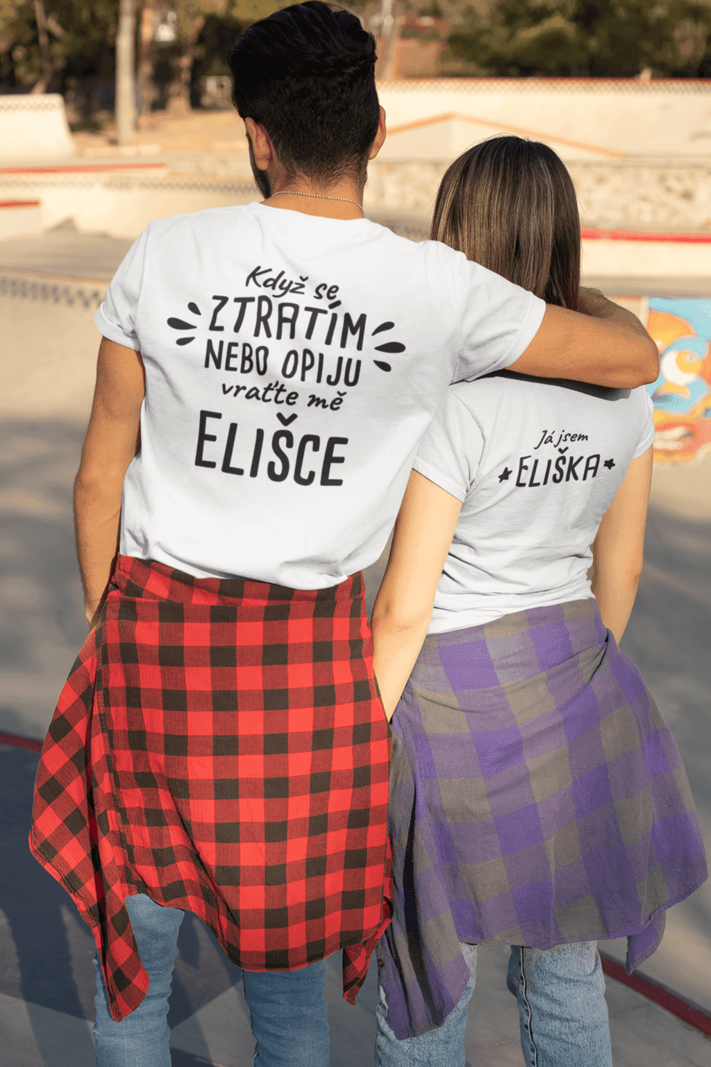 back t shirt mockup of a couple taking a walk at a skatepark 25236
